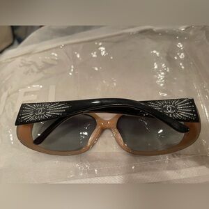 CHANEL Black and Tan Sunglasses with Sleek Design